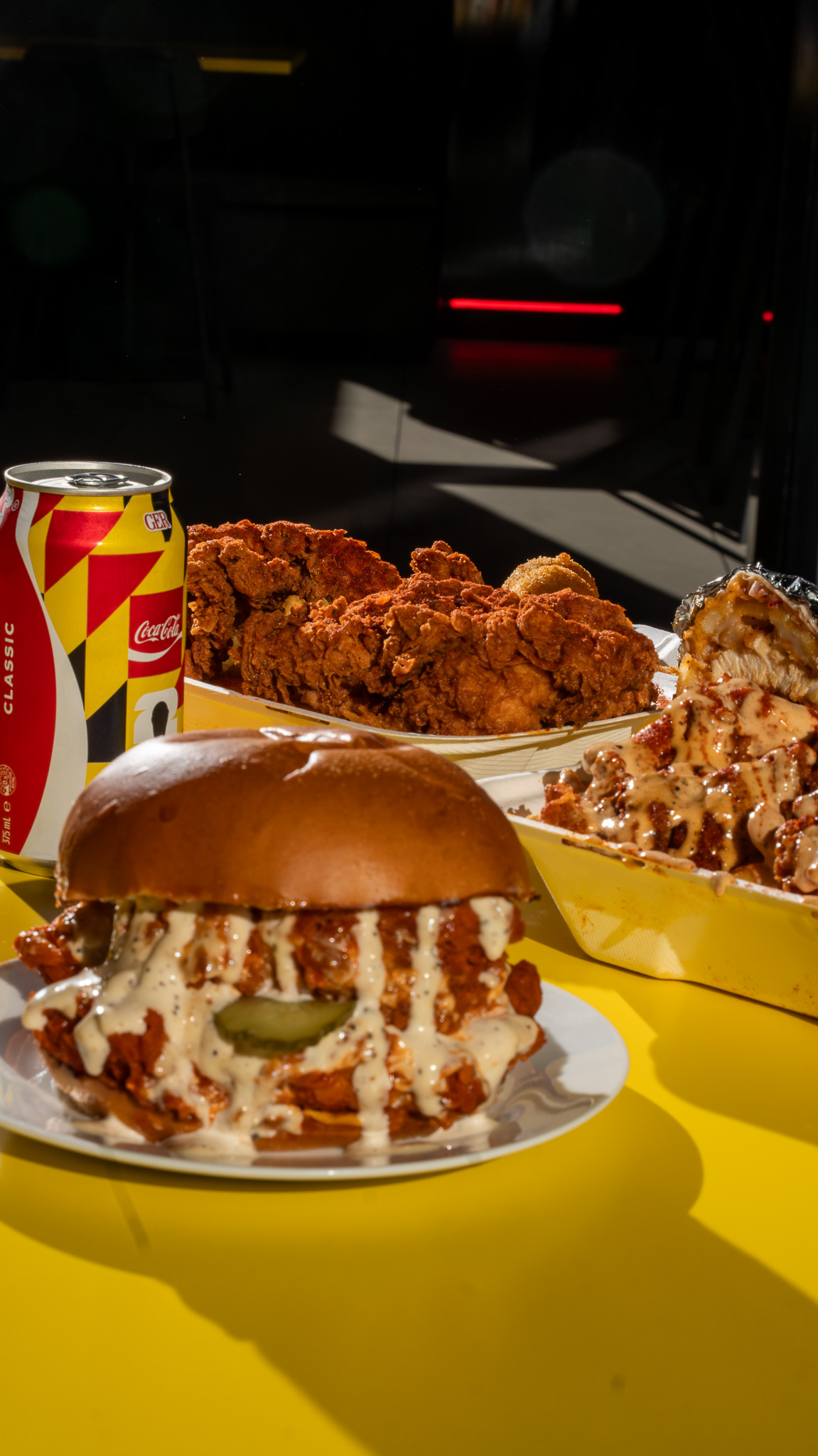 Nashville chicken sando with ranch drizzle and fried chicken